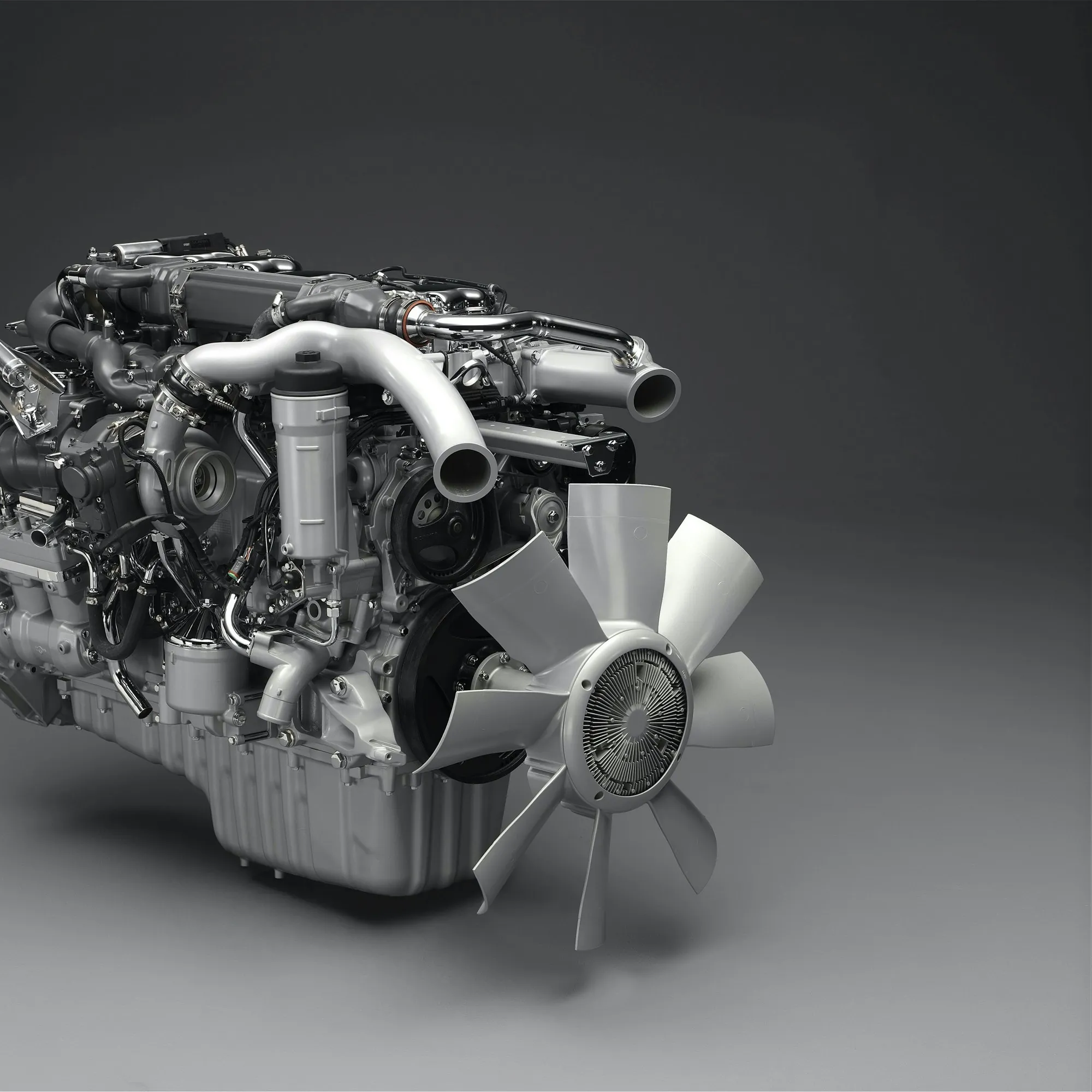 Light-duty diesel engine with turbocharger shown on a gray background
